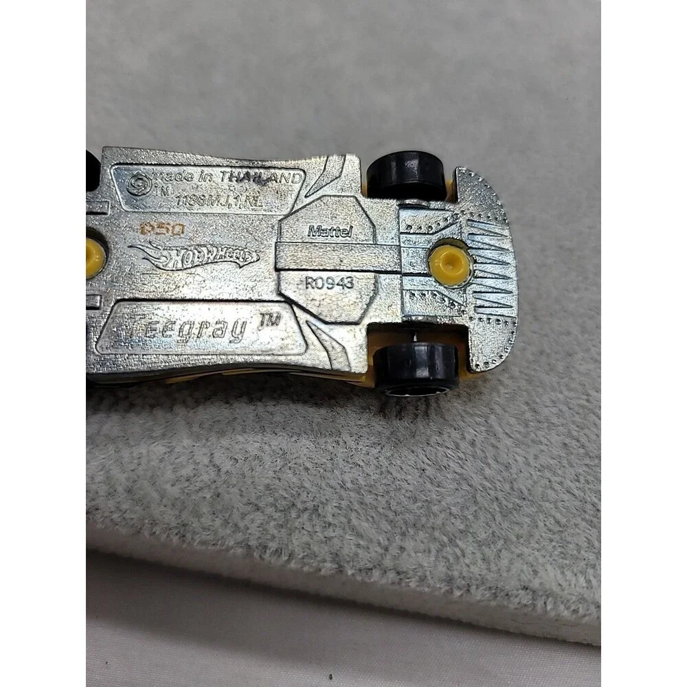 Hot Wheels Teegray Yellow Exotic Sports Car with Chrome Wheels 1:64